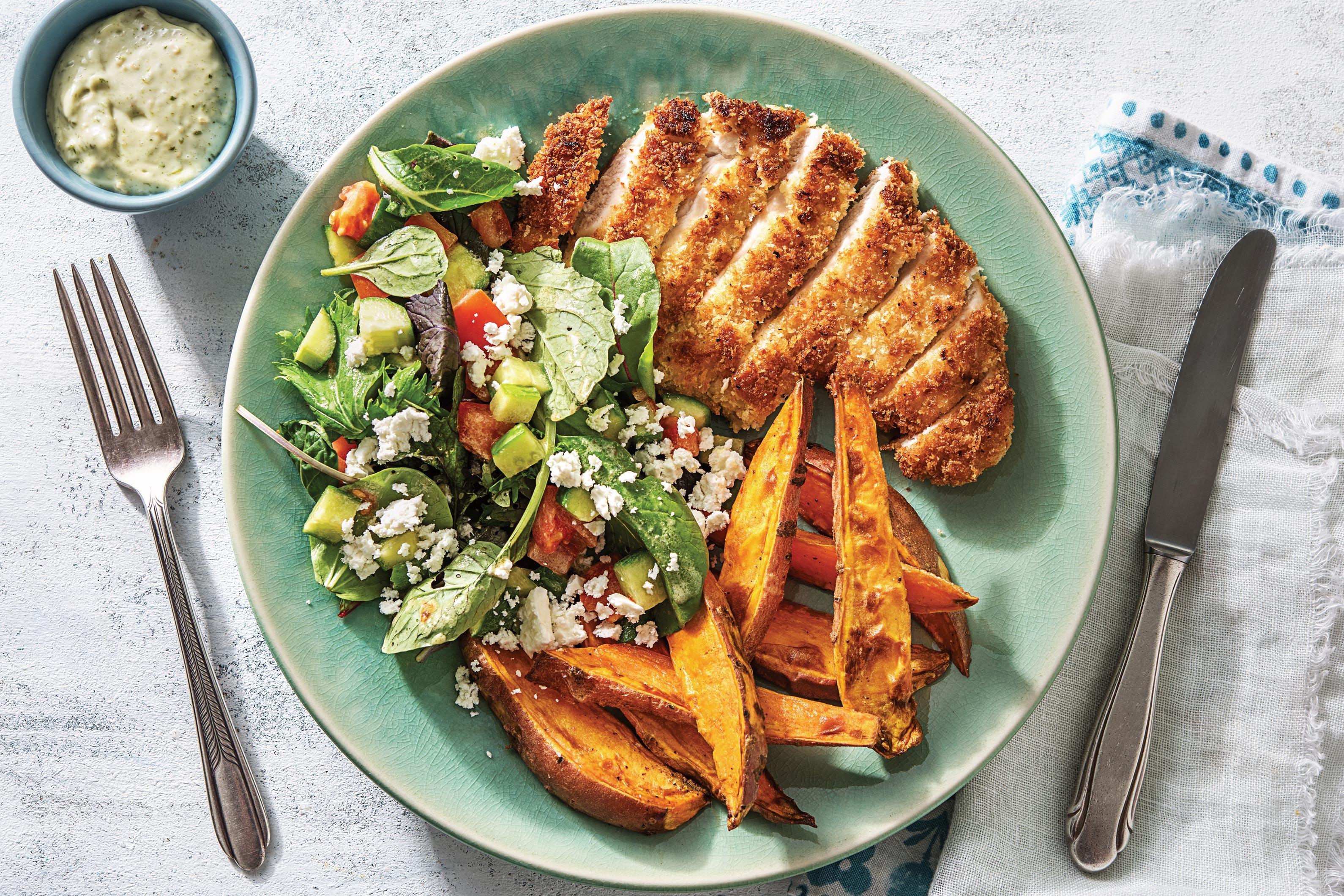 Lemony Crumbed Chicken with Pesto Dressing & Sweet Potato Wedges