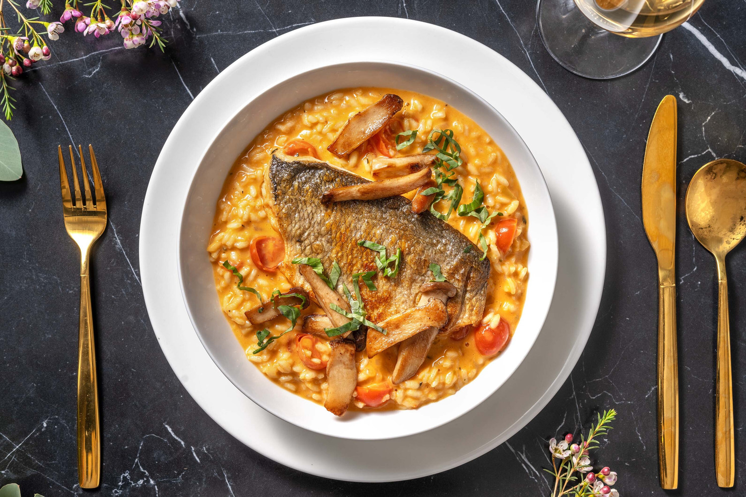 Dorade auf Pilzrisotto mit gebackenen Cherry-Tomaten
