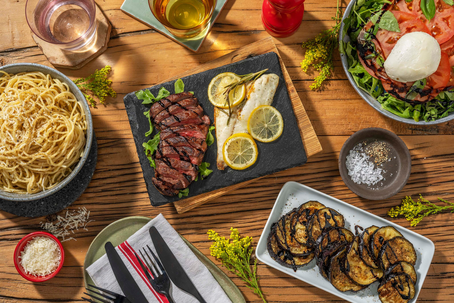 Festin à l'italienne avec dorade au four et tagliata di manzo