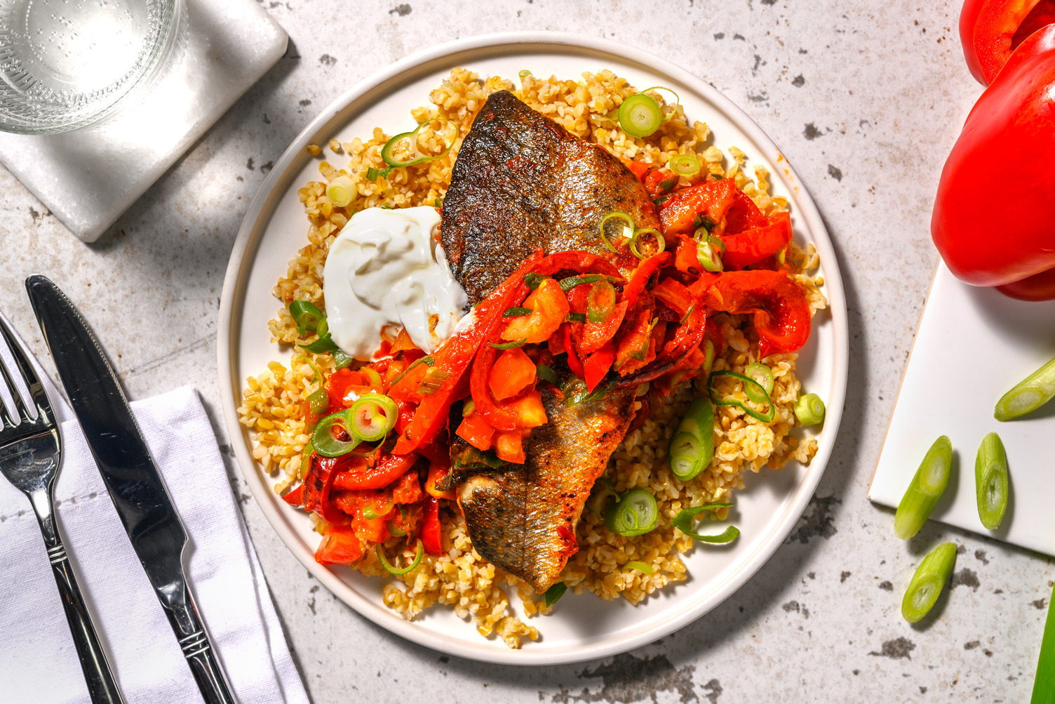 Gebakken heekfilet met Mediterraanse bulgur