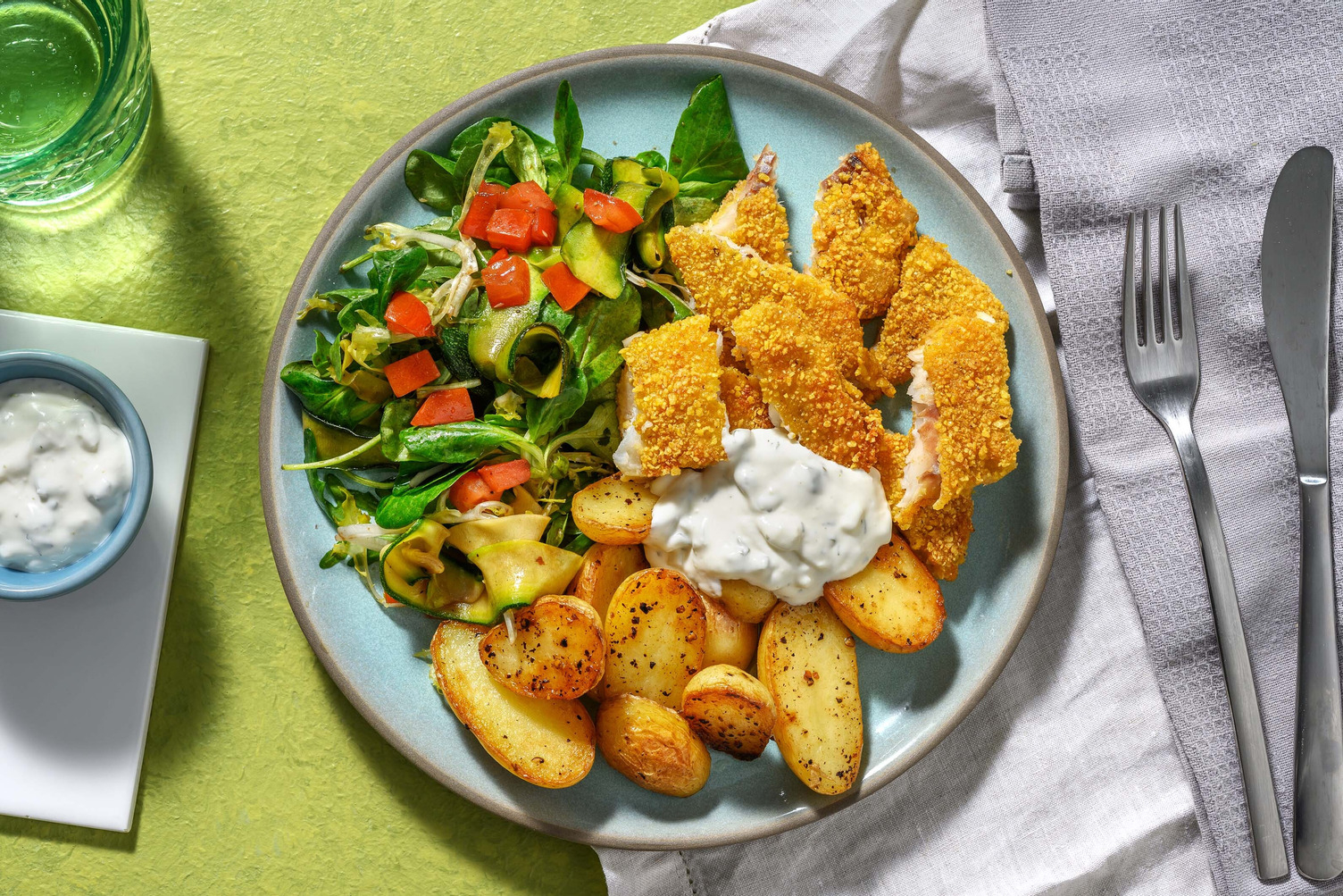 Filet de merlu pané et grenailles poêlées
