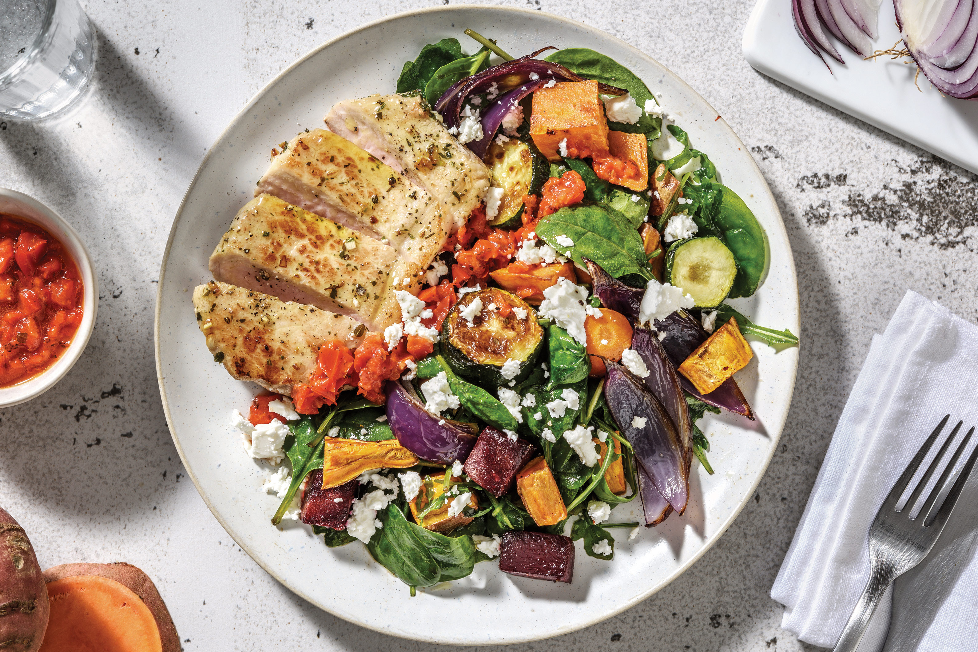 Garlicky Pork & Roast Veggie Toss with Chargrilled Capsicum Relish & Fetta