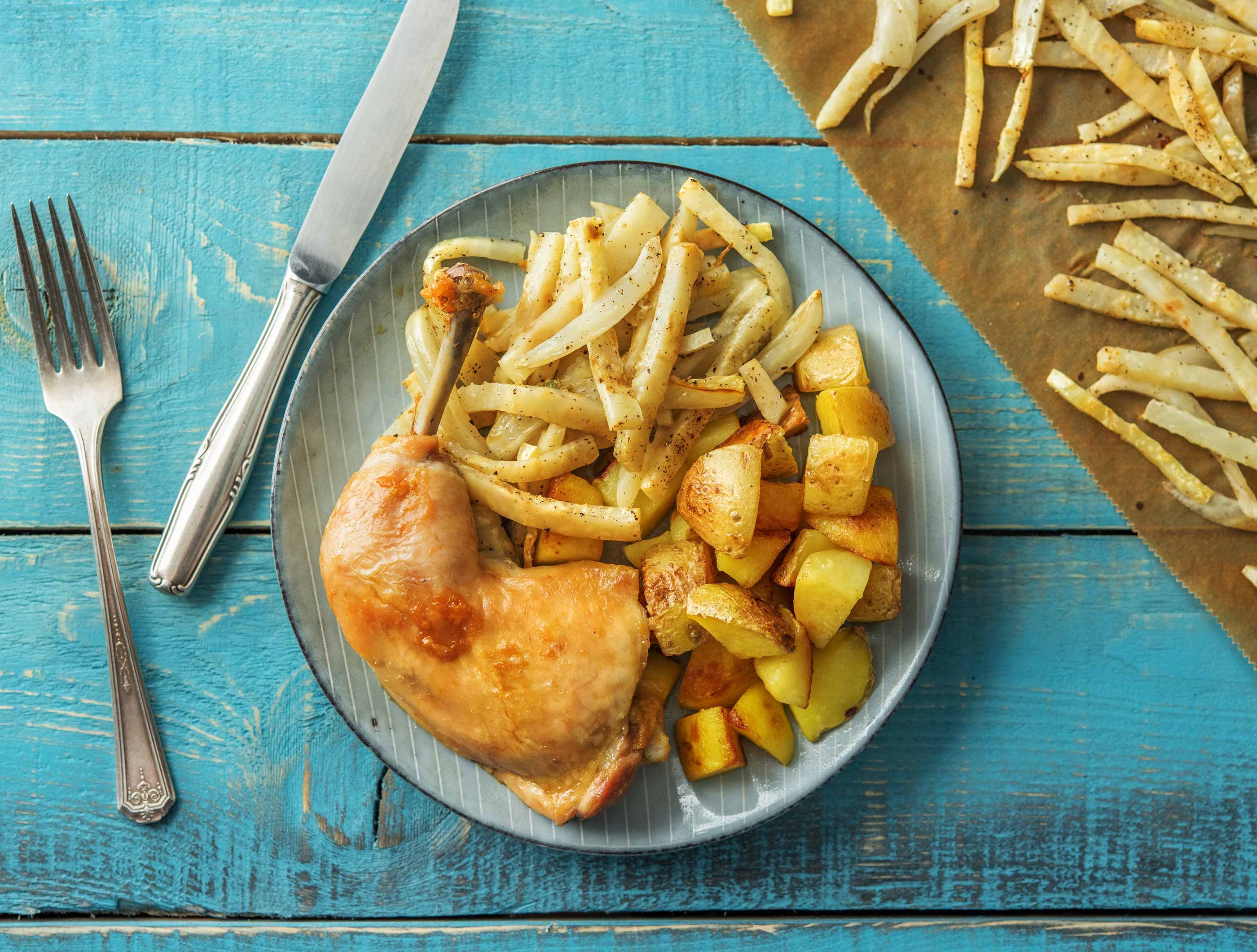 Gekonfijte kippendij met winterkost uit de oven