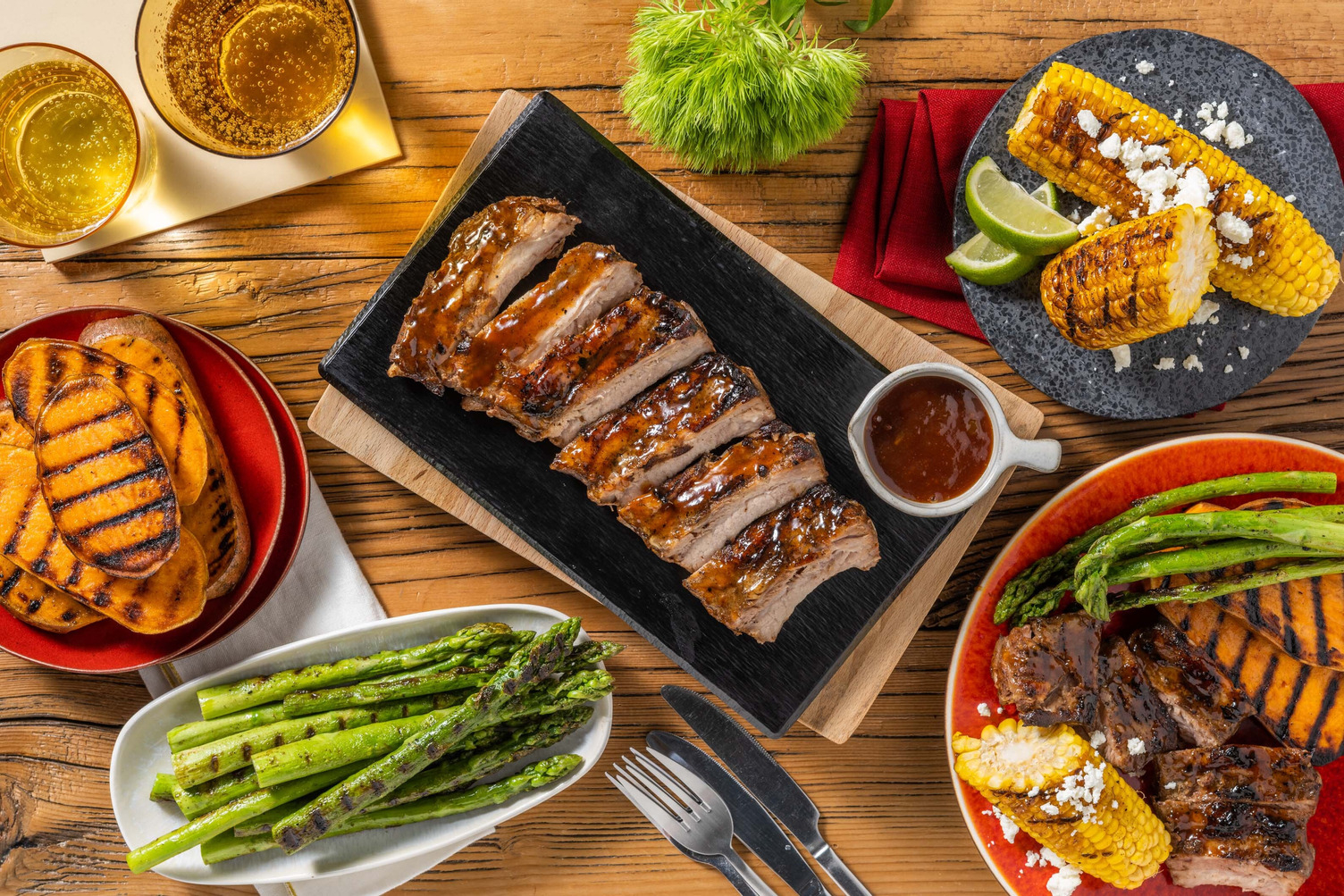 Grilled Mango-Chipotle Ribs and Feta-Buttered Corn