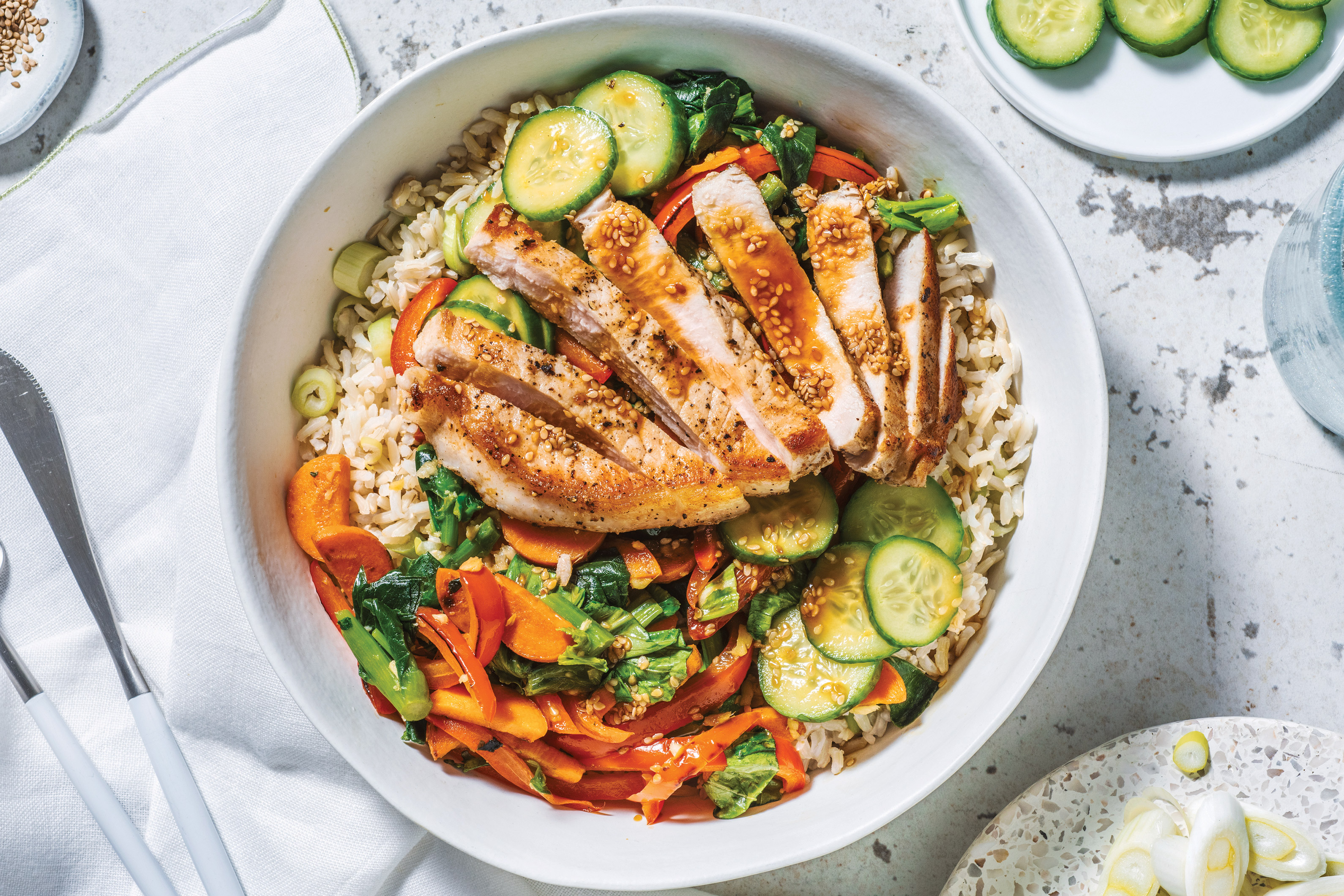 Orange Sesame Pork & Ginger Veggies with Brown Rice & Pickled Cucumber