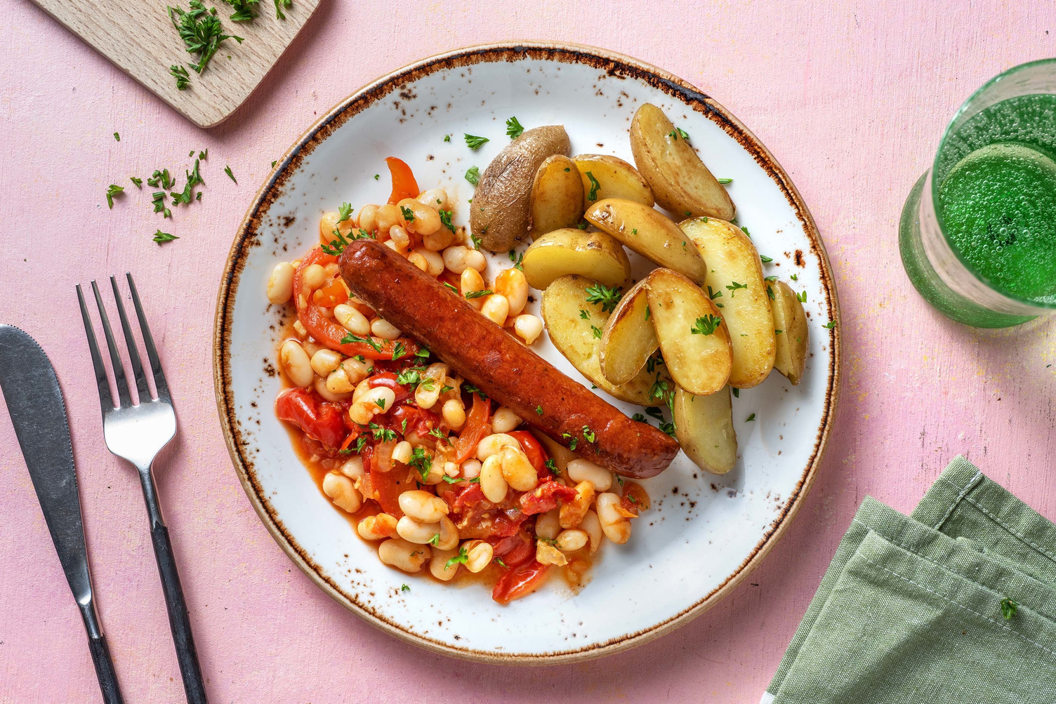 Rundermerguez met kruidige tomaat-bonenstoof