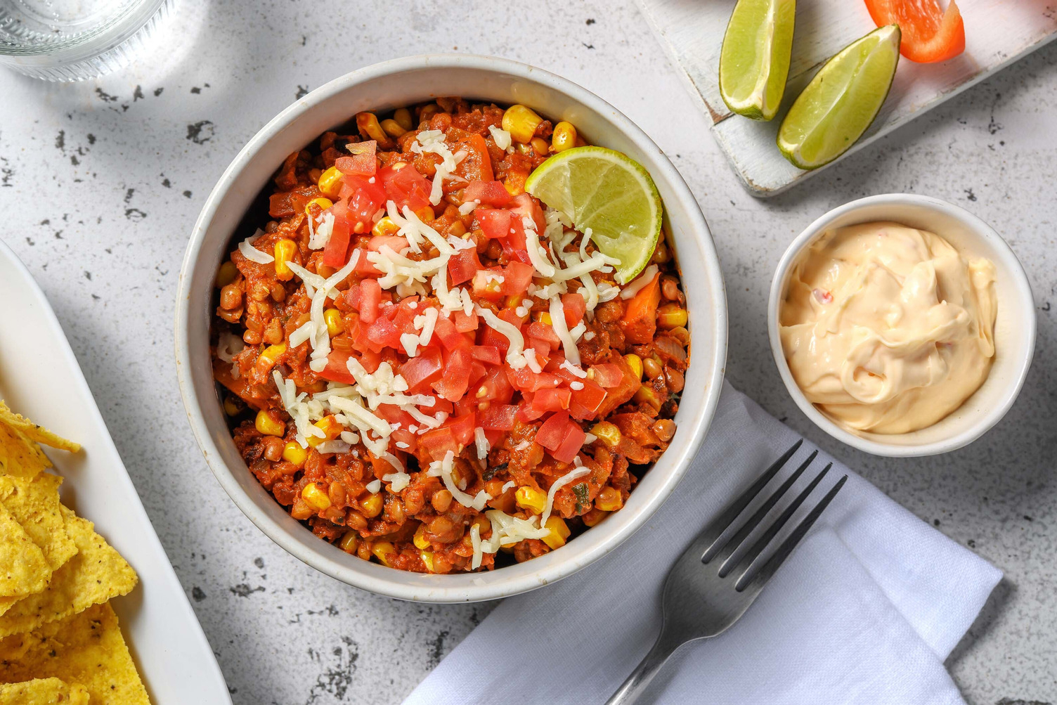 Mijoté de lentilles et chips de tortilla épicées