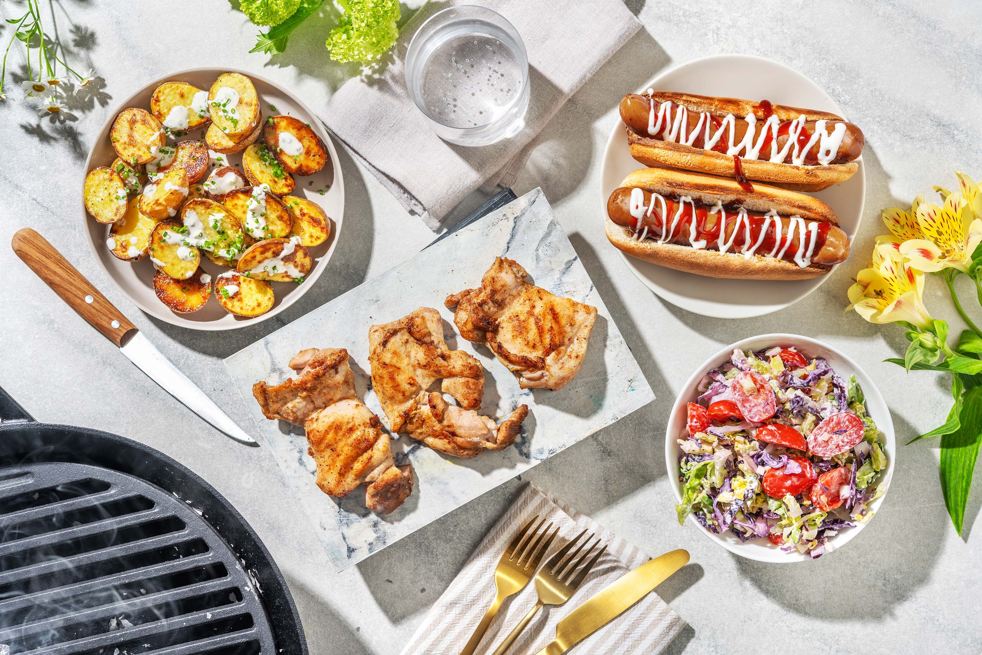 Mississippi Rubbed Chicken Thighs and BBQ Sausages in Buns