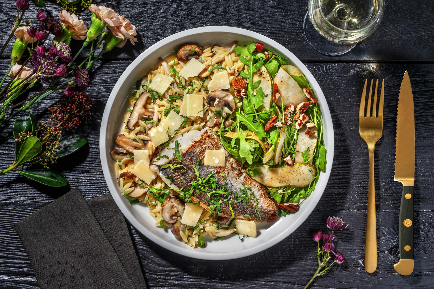 Truffelorzo met doradefilet en paddenstoelen