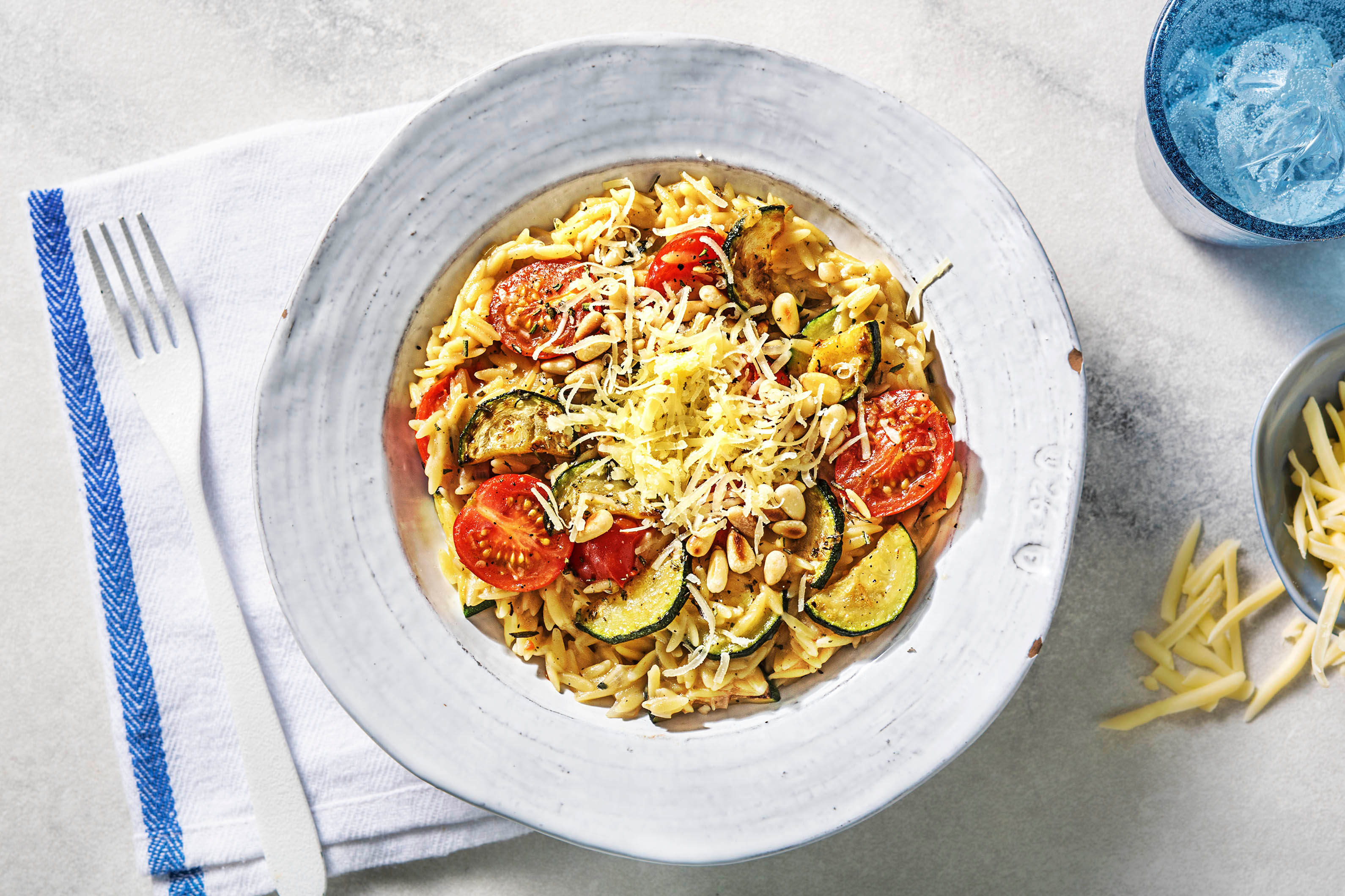 Orzo met cherrytomaten en courgette