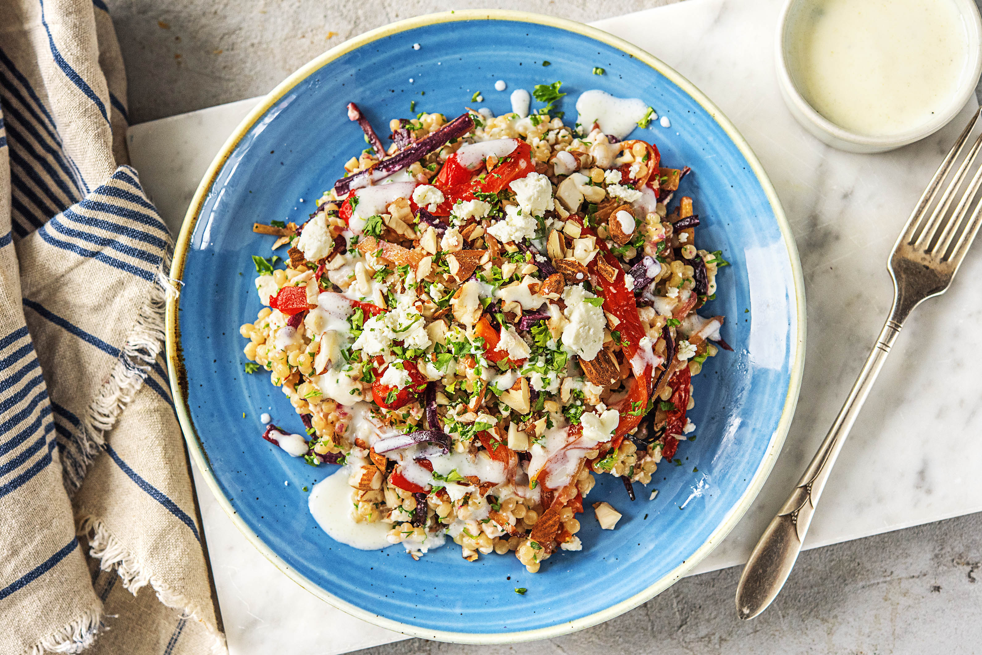 Parelcouscous met gekleurde peen