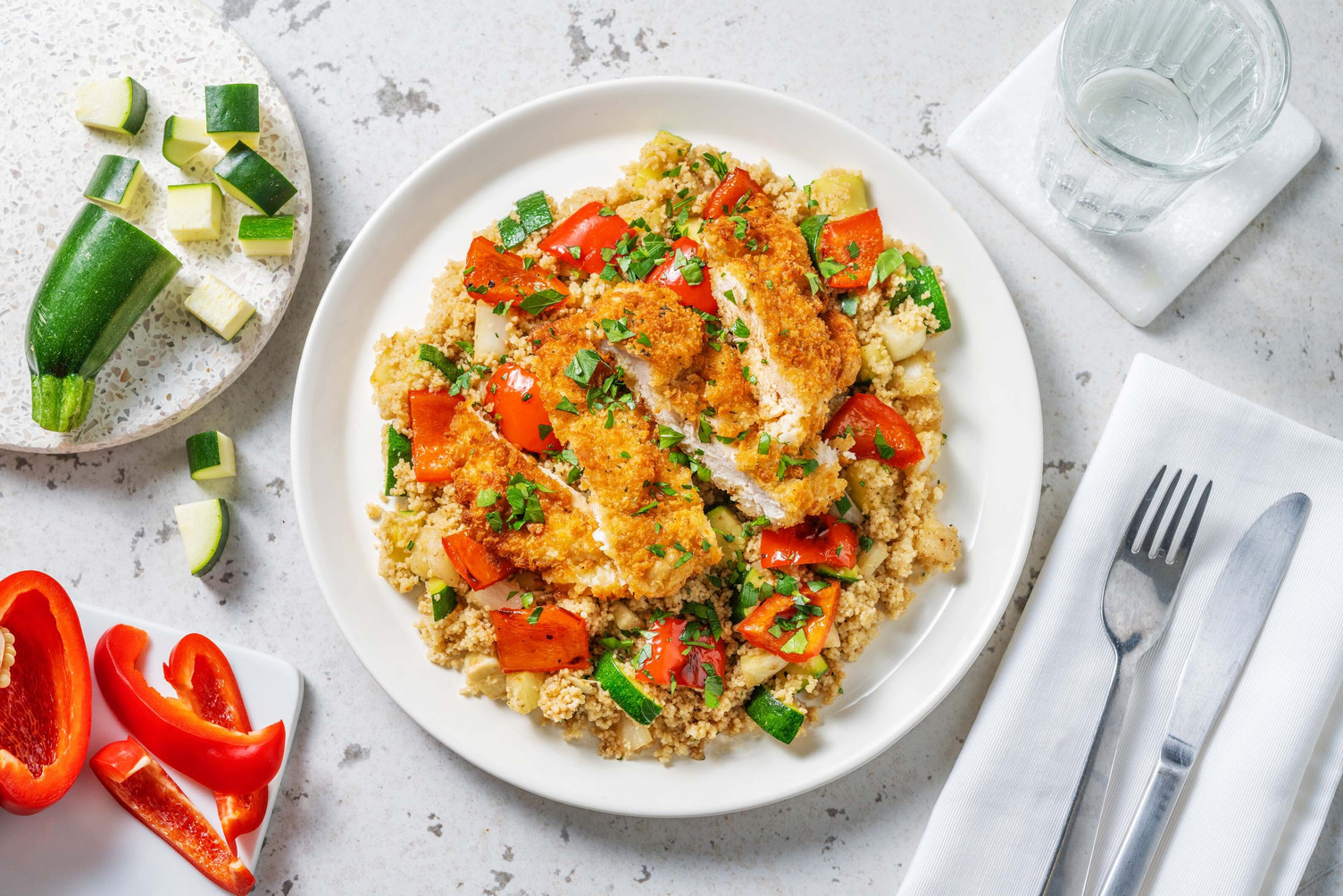 Poulet pané au romarin et semoule aux légumes