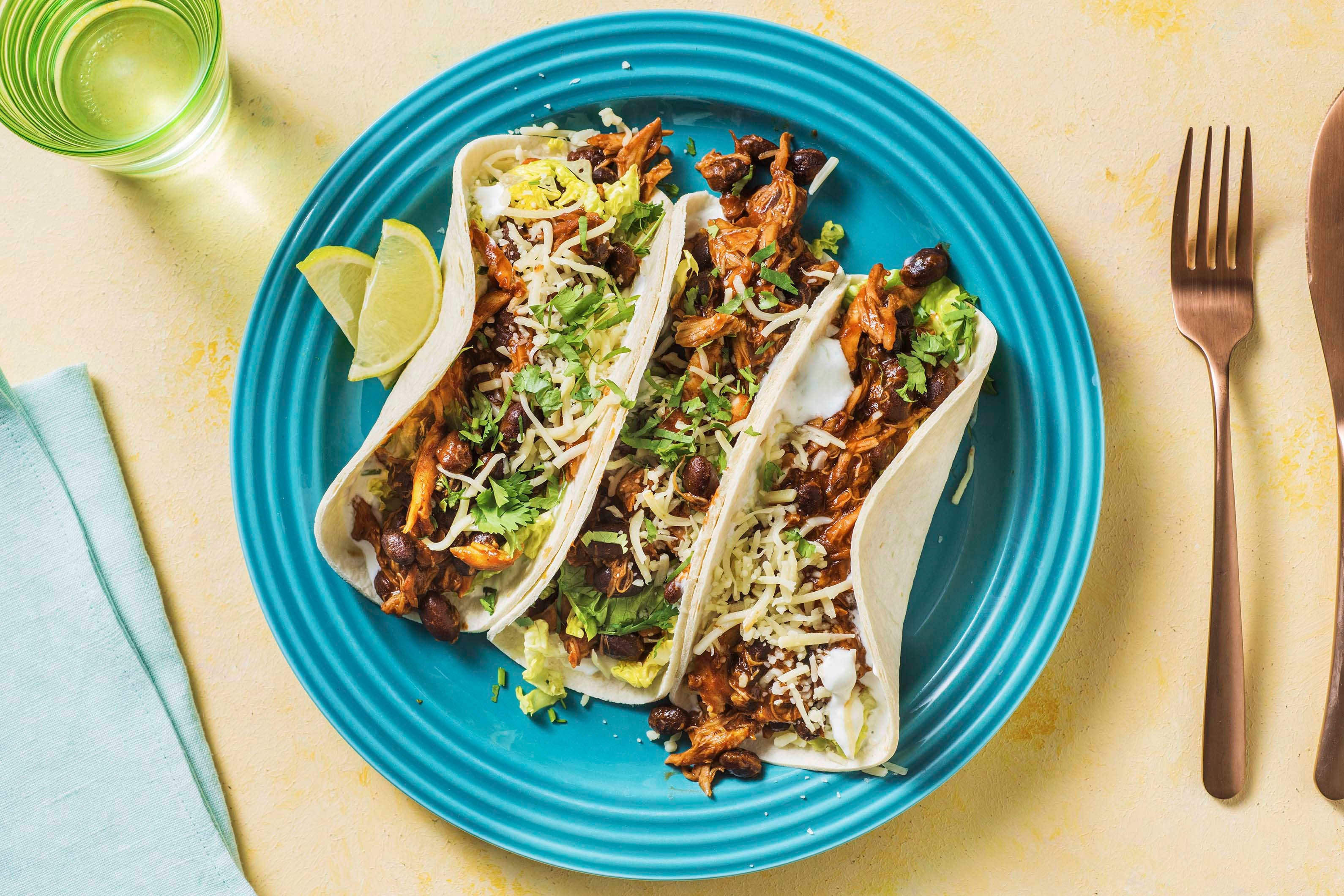 Cheesy Pulled Chicken & Black Bean Tacos