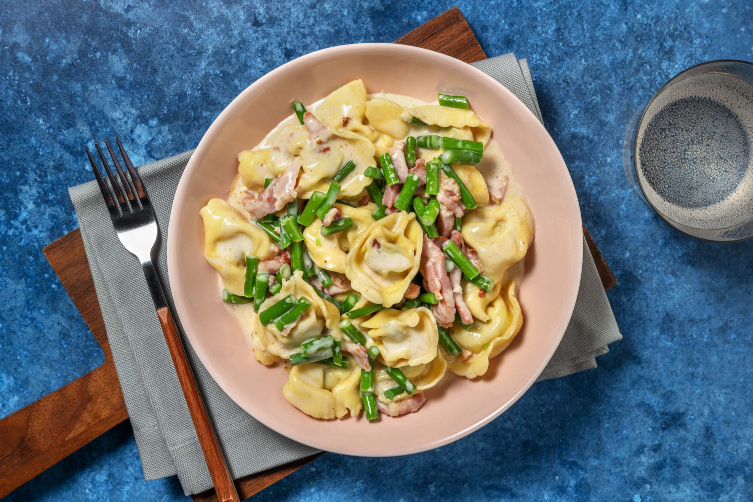 Spinat-Ricotta-Tortellini mit Krustenschinken 