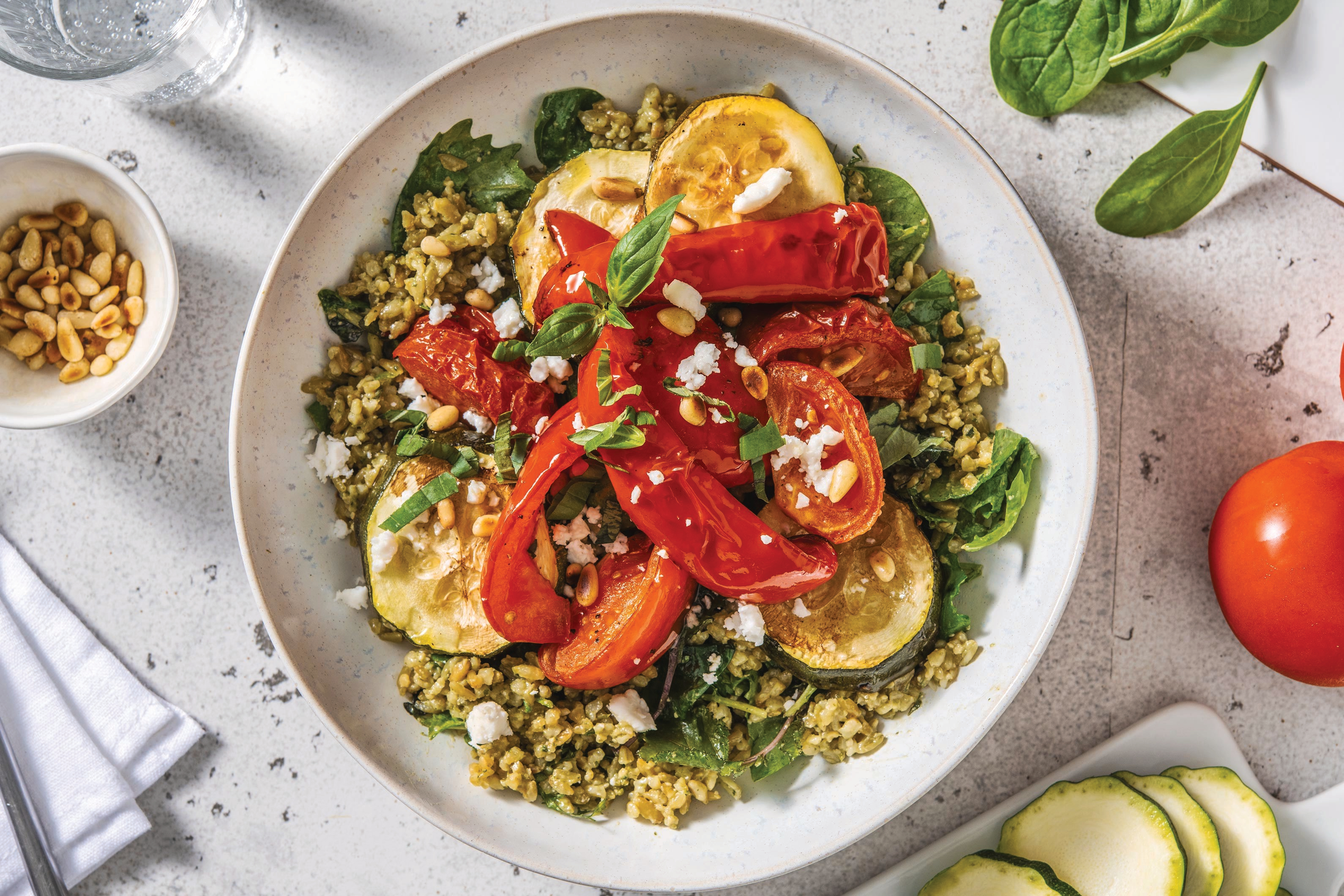 Roast Veggie & Basil Pesto Freekeh Bowl with Rocket, Goat Cheese & Pine Nuts