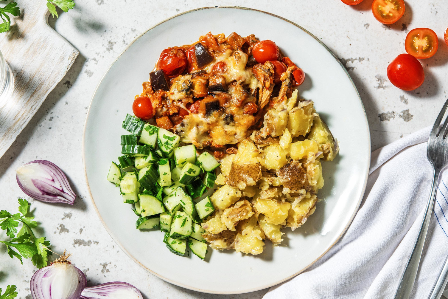 Gegratineerde sardines in tomatensaus met aubergine