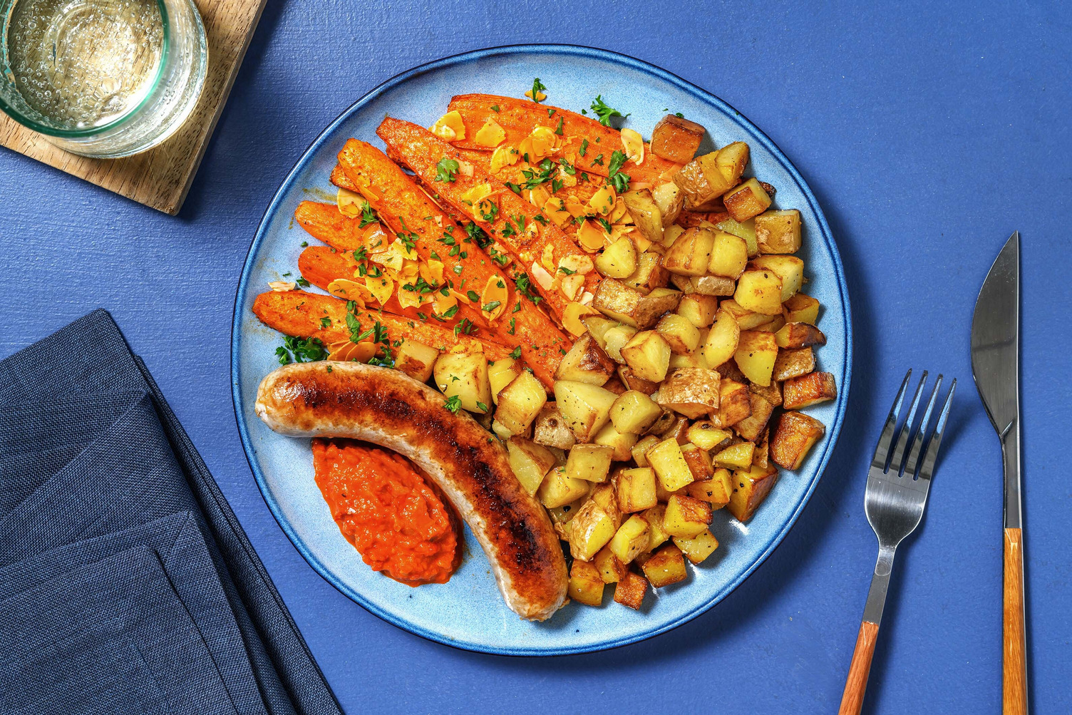 Saucisse de porc citron-thym et patatas bravas
