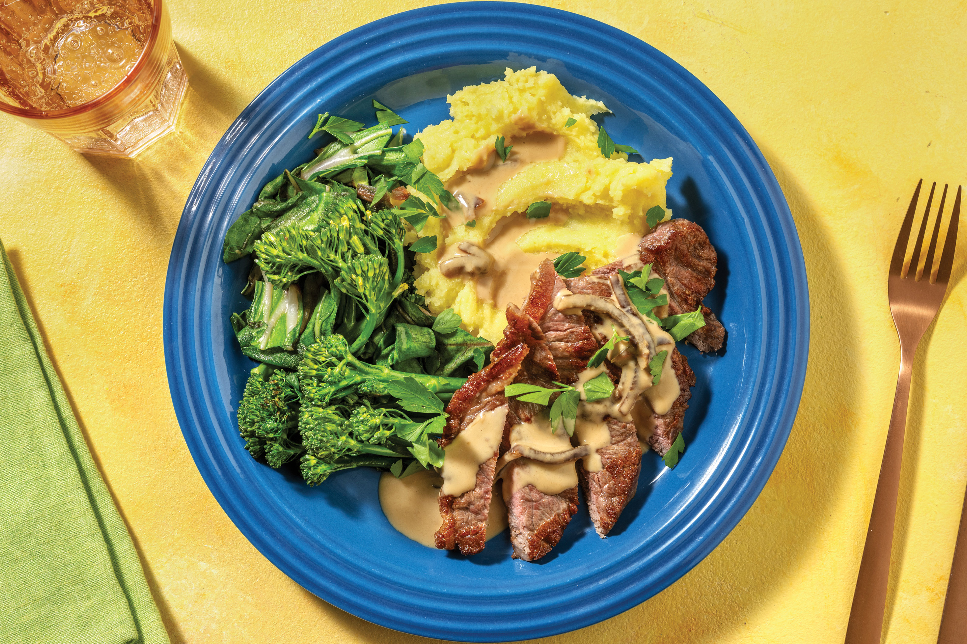 Seared Beef Rump & Creamy Onion Sauce with Mash & Greens