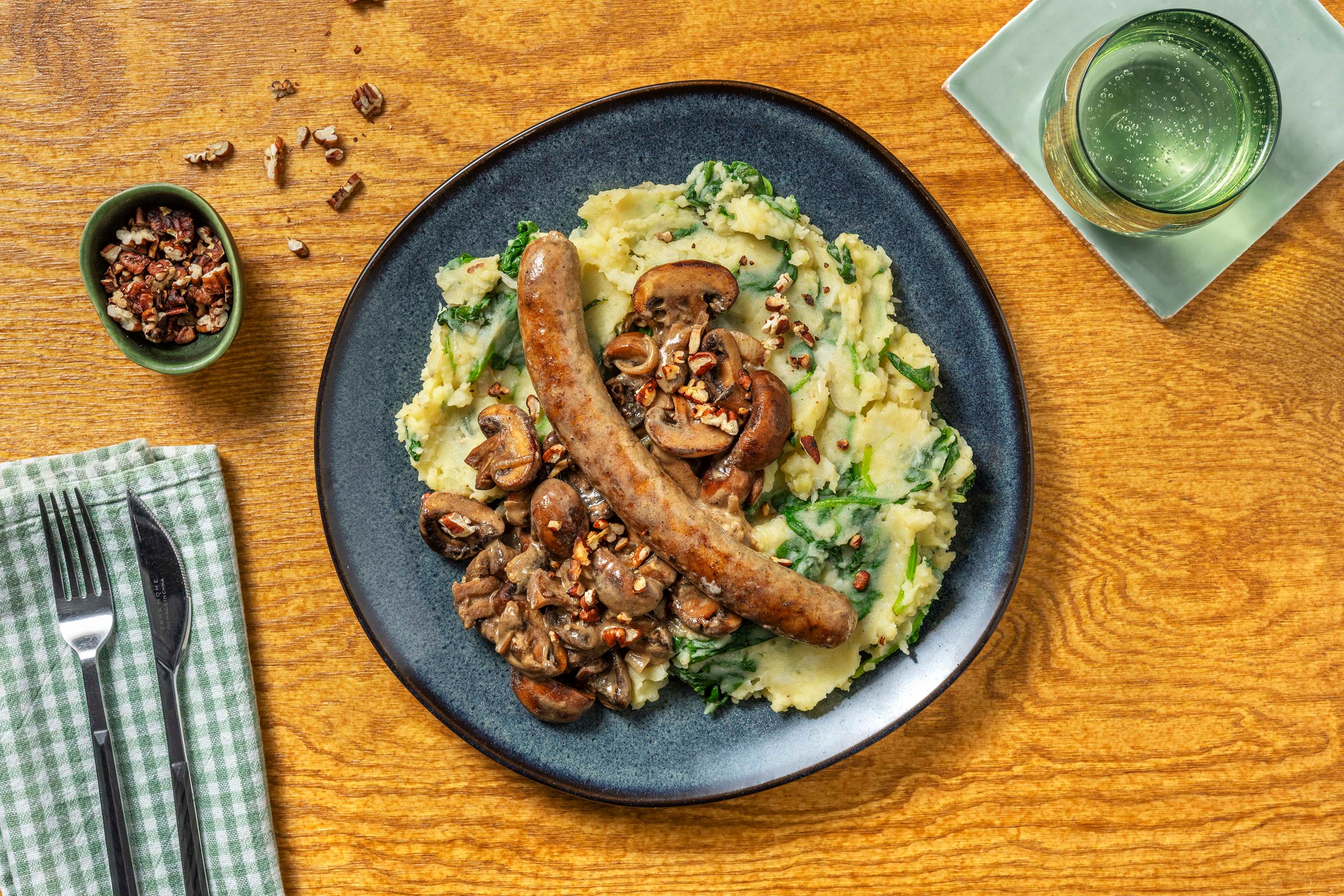 Saucisse fermière, purée d'épinards et céleri-rave