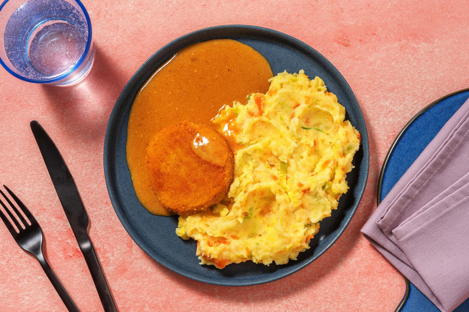 Steak suisse, purée de carotte et poireau