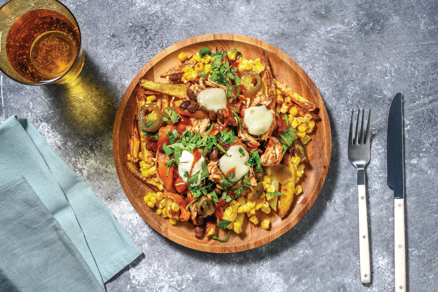 Tex-Mex Chicken & Black Bean Loaded Fries with Bocconcini, Pickled Jalapeños & Sour Cream