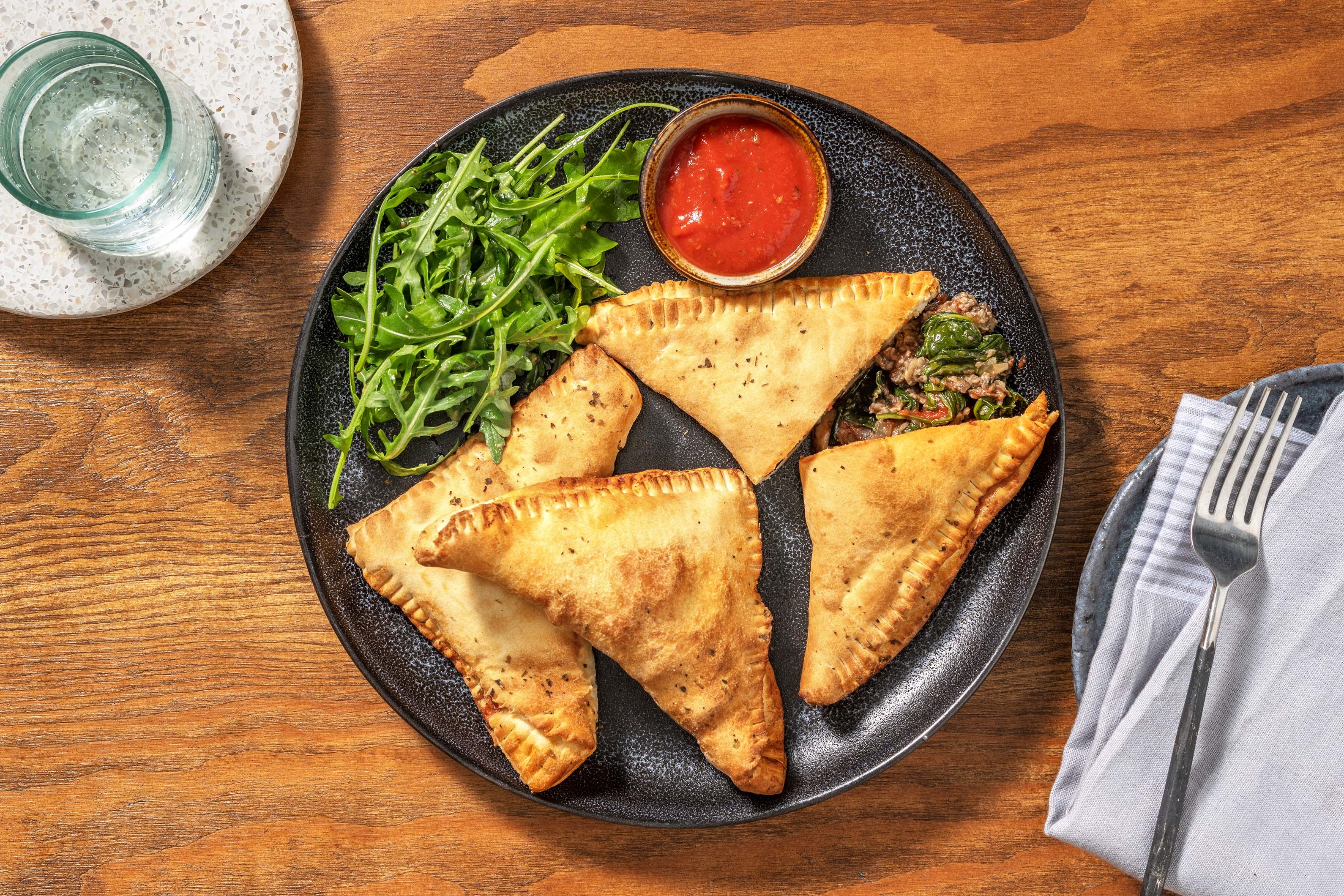 Vegane Mini-Calzones mit Spinat-Champignon-Füllung