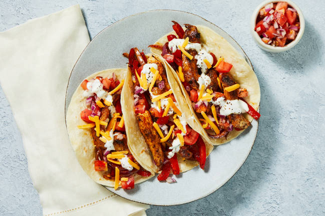 Fajitas de porc aux poivrons rôtis et aux oignons