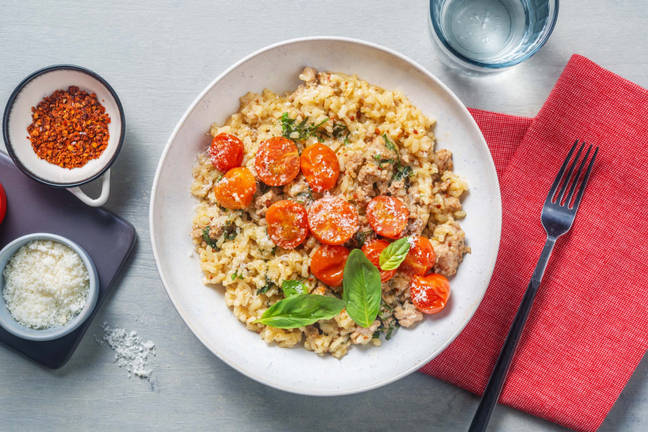 Risotto fondente alla salsiccia e pomodorini