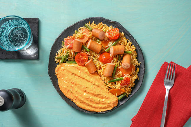 Bunte Reispfanne mit Wiener Würstchen