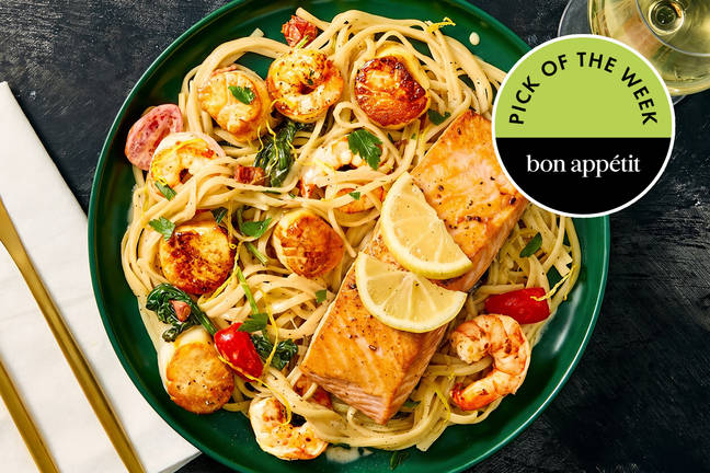 Salmon “en Papillote” over Seafood Linguine