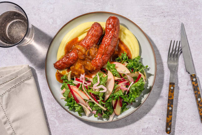 Ovnstegte kålpølser i løgsauce