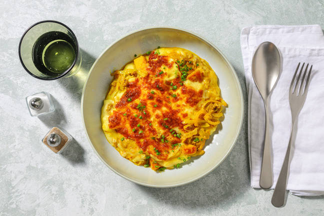 Cheesy cottage pie met currypoeder en bieslook