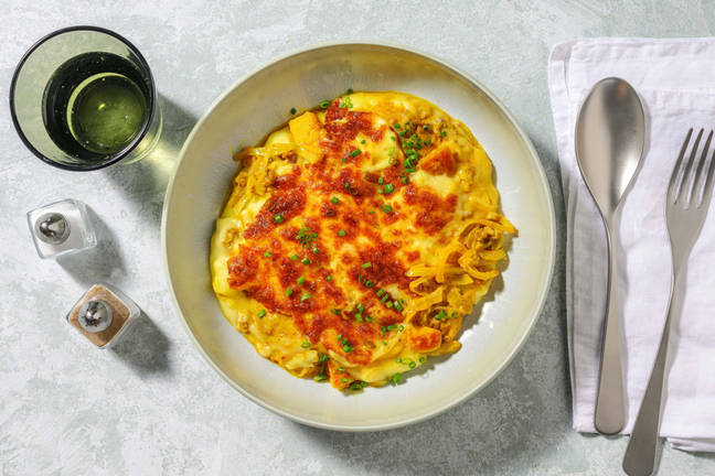 Cheesy cottage pie met currypoeder en bieslook