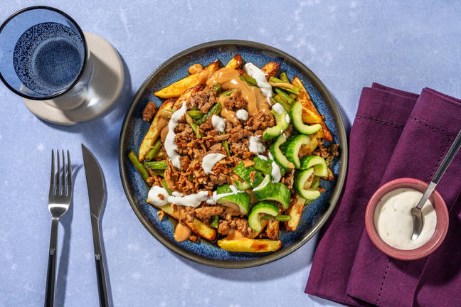 Frites maison garnies de poulet façon saté