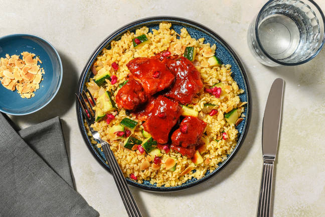 Poulet en sauce harissa-grenade & amandes effilées
