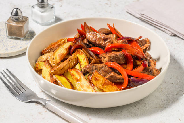 Lomo adobado saltado al estilo peruano