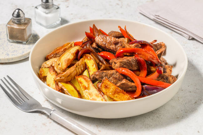 Lomo adobado saltado al estilo peruano