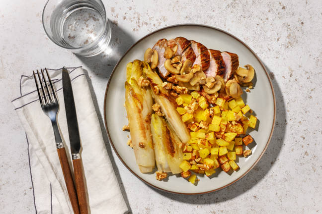 Porc sauce champignons, endives braisées & noix