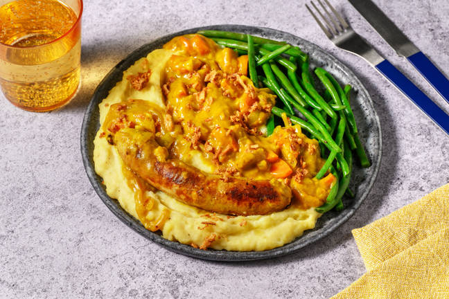 Brandt & Levie Sausage in Curry Sauce with Crispy Onions