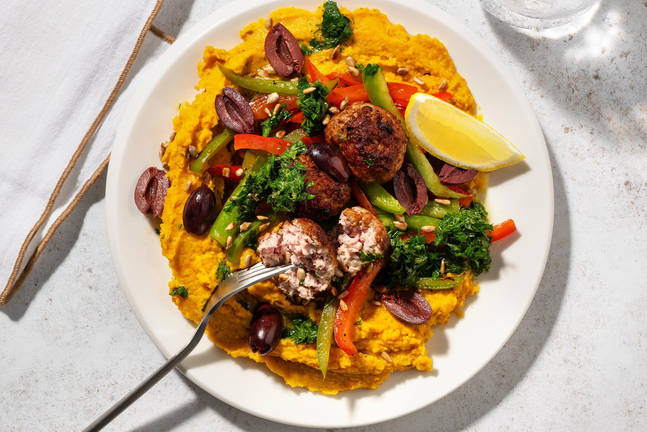 Boulettes de poulet sur purée de carotte et lentilles