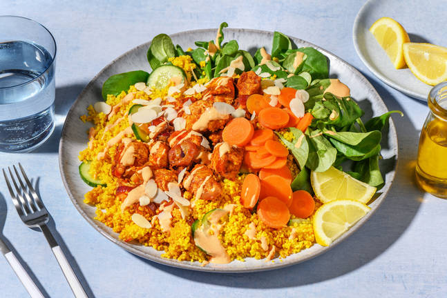Dinde sur semoule, sauce curry & amandes effilées