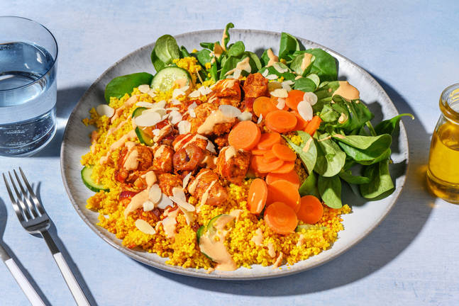 Dinde sur semoule, sauce curry & amandes effilées