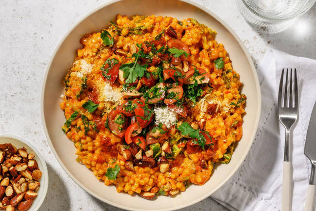 Risotto d'orge perlé crémeux à la harissa et chou frisé