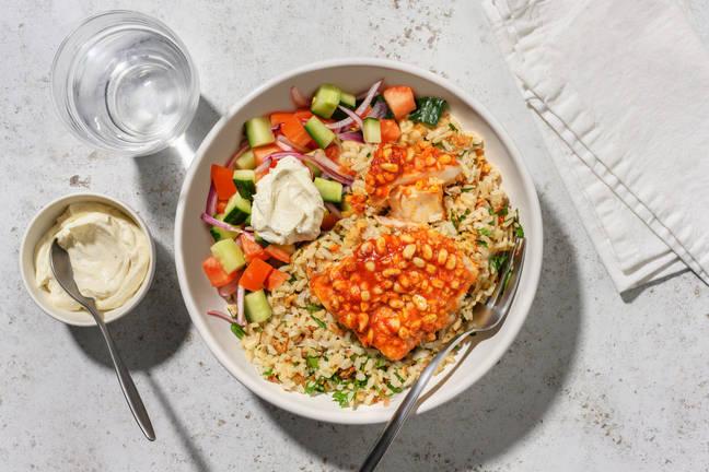 Vit fisk med harissa- och pinjenötstäcke