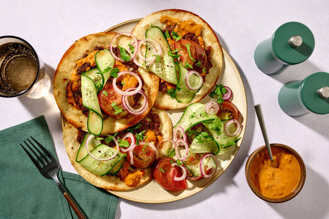 Smashed tacos au butter chicken