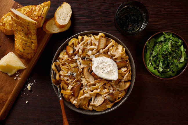 Mozzarella Topped Triple Mushroom Tagliatelle