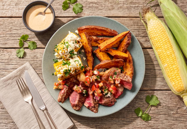 Grilled Striploin with Corn Elote, Sweet Potatoes and Pico de Gallo