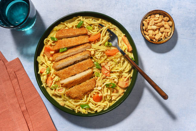 Veggie schnitzel met gele currynoedels