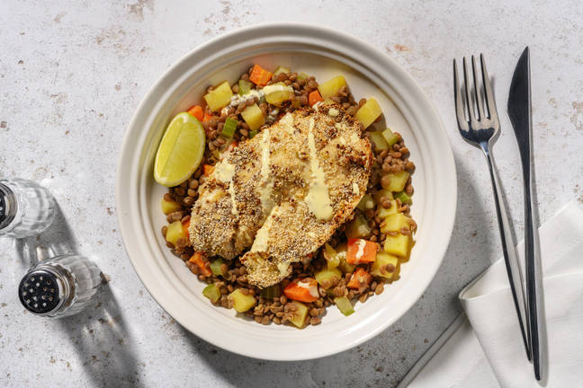 Pangasius mit Senfkruste auf Linsengemüse 