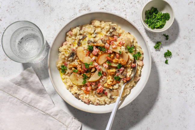 Risotto met gekaramelliseerde peer, guanciale en kaas
